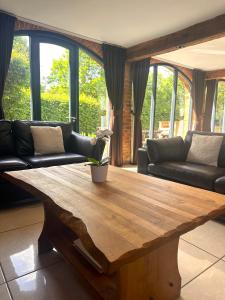 Гостиная зона в Rats Retreat at Tove Valley Cottages