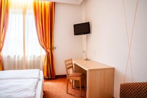 TV a/nebo společenská místnost v ubytování Enrosadira