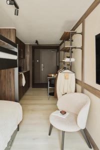 TV a/nebo společenská místnost v ubytování Raibu Ghent by StayC