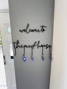 a door with a sign that reads welcome to the wonderful house at Higher Lane House in Plymouth