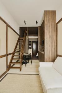 Postel nebo postele na pokoji v ubytování Raibu Ghent by StayC + 75 fotografií