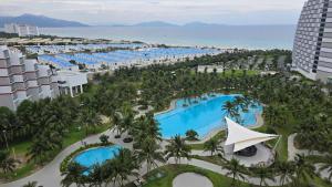 an aerial view of the pool at the paradiso resort at Arena Resort Cam Ranh in Cam Ranh International Airport