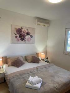 Ένα ή περισσότερα κρεβάτια σε δωμάτιο στο Apartment Viniška