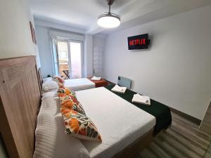 Postel nebo postele na pokoji v ubytování Casa Pinares de Venecia + 14 fotografií