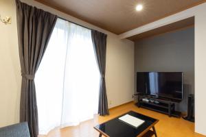 Televisyen dan/atau pusat hiburan di Chiyo House x M&Z HOUSE +29 gambar
