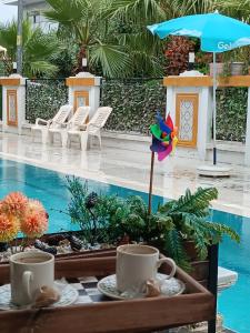 Bazén v ubytování Dolunaydın Butik Otel nebo v jeho okolí