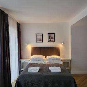 Posteľ alebo postele v izbe v ubytovaní Apartamenty Julia APARTAMENTY OZONOWANE