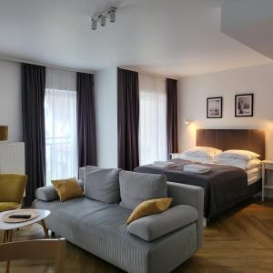 Posteľ alebo postele v izbe v ubytovaní Apartamenty Julia APARTAMENTY OZONOWANE