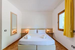 Ένα ή περισσότερα κρεβάτια σε δωμάτιο στο Iglesias Countryside, Nature & Pool