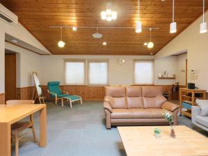 Posezení v ubytování Urayasu Horie House -浦安堀江ハウス- Disneylandまで約30分 Wi-Fi 駐車場付で1棟貸切