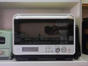 Kuchyň nebo kuchyňský kout v ubytování Urayasu Horie House -浦安堀江ハウス- Disneylandまで約30分 Wi-Fi 駐車場付で1棟貸切