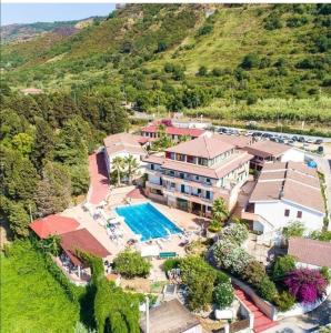 an aerial view of a house with a swimming pool at San Domenico Village in Fitili