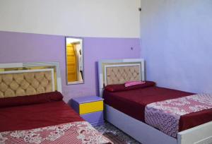Postel nebo postele na pokoji v ubytování nobiano hostel