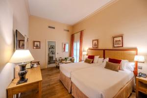 Кровать или кровати в номере Casa Romana Hotel Boutique