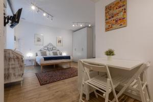 A seating area at San Salvario Apartments by Wonderful Italy