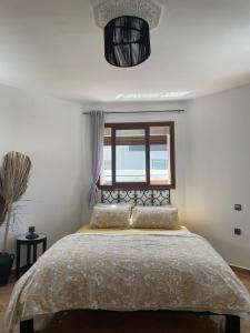 Postelja oz. postelje v sobi nastanitve Syrah Home