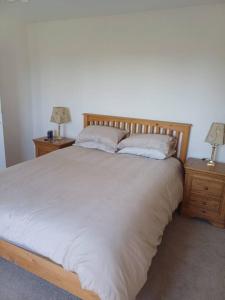 Katil atau katil-katil dalam bilik di Clova Cottage 7BR Retreat