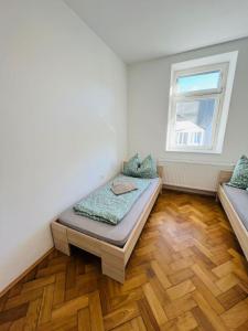 Postel nebo postele na pokoji v ubytování Leoben Top 6