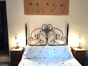 Postel nebo postele na pokoji v ubytování Baraka Boutique Pensión + 10 fotografií