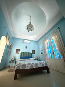 Postel nebo postele na pokoji v ubytování maison d hôte rêve de désert jerba