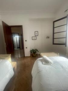 Postelja oz. postelje v sobi nastanitve Syrah Home