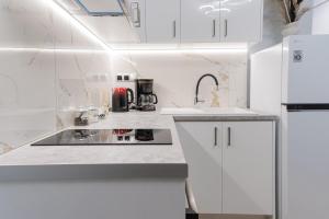 Una cocina o kitchenette en Moet Apartment free private parking