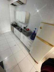 Kuchyň nebo kuchyňský kout v ubytování Meu cantinho + 2 fotografie