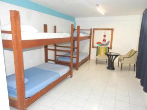 Postel nebo postele na pokoji v ubytování Downtown Hostel Chetumal