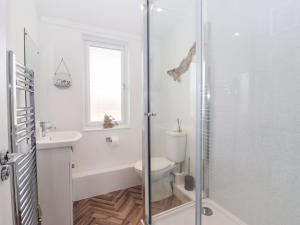 Koupelna v ubytování Bonny Bay + 15 fotografií