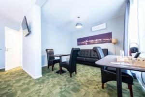TV a/nebo společenská místnost v ubytování Hotel Temse