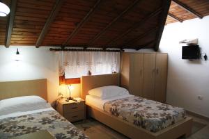 Postel nebo postele na pokoji v ubytování Hotel Boutique Osumi