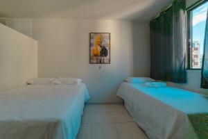 Postel nebo postele na pokoji v ubytování Apartamento Econômico - LP22