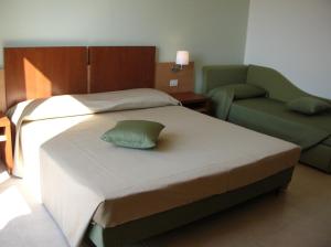 Letto o letti in una camera di Hermes Hotel