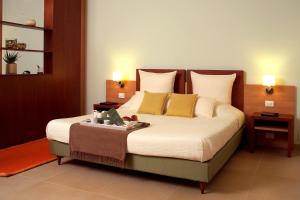 Letto o letti in una camera di Hermes Hotel