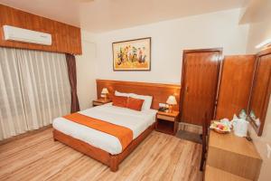 Katil atau katil-katil dalam bilik di Mount View Pokhara