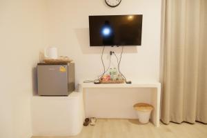 TV a/nebo společenská místnost v ubytování Sunvada Beach Rayong
