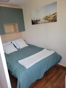 Postel nebo postele na pokoji v ubytování Bel appart avec parking, proche centre et plages