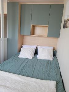 Postel nebo postele na pokoji v ubytování Bel appart avec parking, proche centre et plages
