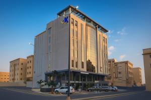 a rendering of a building with cars parked in front at شقق كيان للشقق المخدومة in Abha