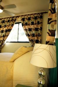 Ein Bett oder Betten in einem Zimmer der Unterkunft Casa Naemie
