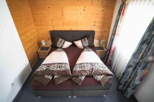 Postel nebo postele na pokoji v ubytování HAUS Lampacher
