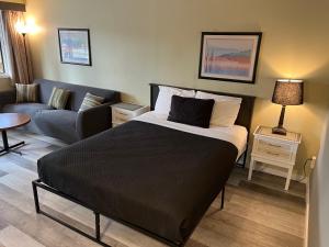Postel nebo postele na pokoji v ubytování Motel Bavaria