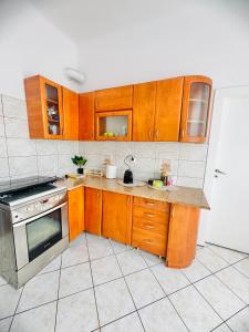 Kuchyň nebo kuchyňský kout v ubytování Apartament Symphonia self check in 24h + 6 fotografií