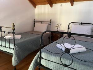 Ένα ή περισσότερα κρεβάτια σε δωμάτιο στο Amoroso Residence