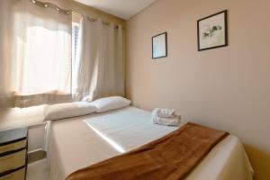 Postel nebo postele na pokoji v ubytování Affordable Apartment UEM AM704