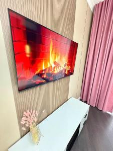 Μια τηλεόραση ή/και κέντρο ψυχαγωγίας στο A luxury apartment with a view