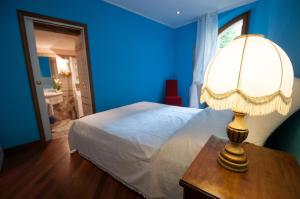 Säng eller sängar i ett rum på Residenza Venezia Cortina