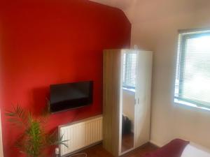 TV a/nebo společenská místnost v ubytování Relax in this Cozy room in Dagenham