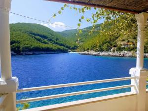 a view of a river from the porch of a house at Jube vacation in Žrnovo