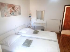 A bed or beds in a room at Villa Elvira